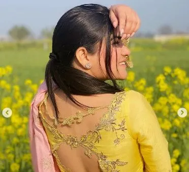 kaur b image of yellow punjabi suit