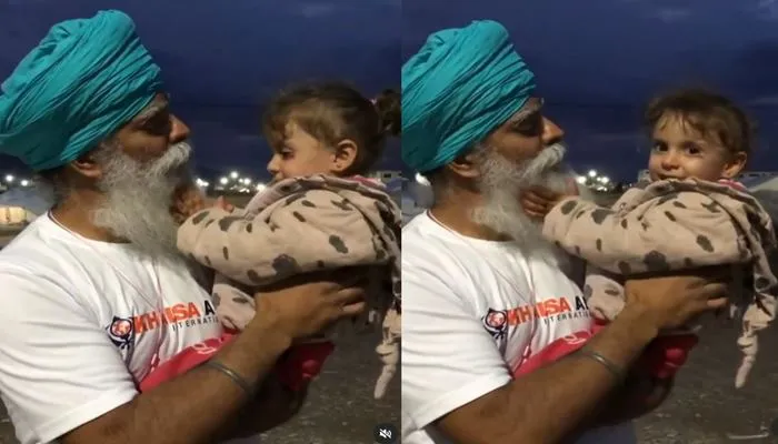 image of ravi singh khalsa and cute baby girl video
