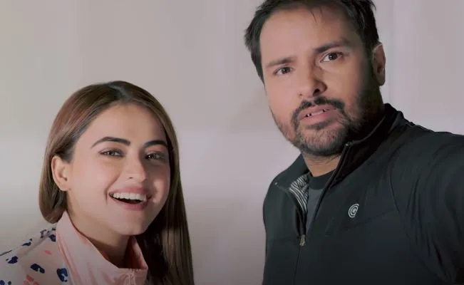 insdie image of simi chahal and amrinder gill