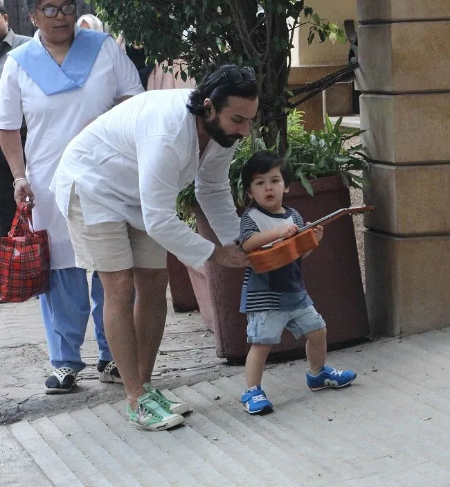 Taimur Ali Khan seems to be taking guitar lessons 