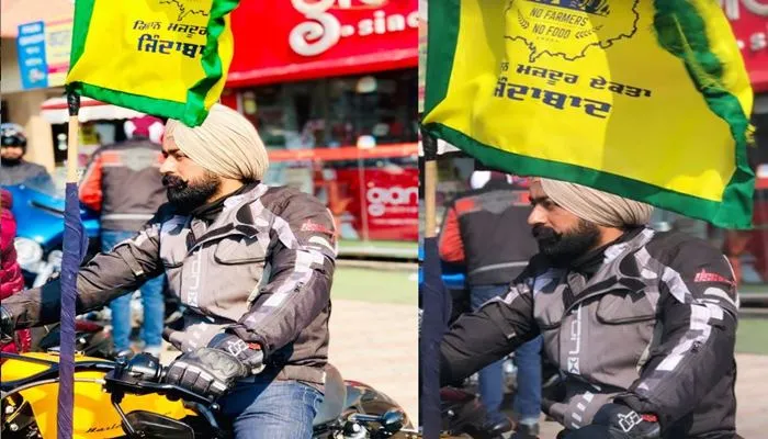 Punjabi Singer Tarsem Jassar puts farmer flags on his bike