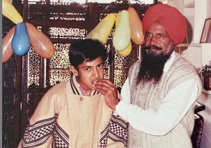 inside image of gippy grewal with his father