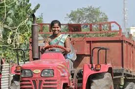 WOMEN WITH TRACTOR