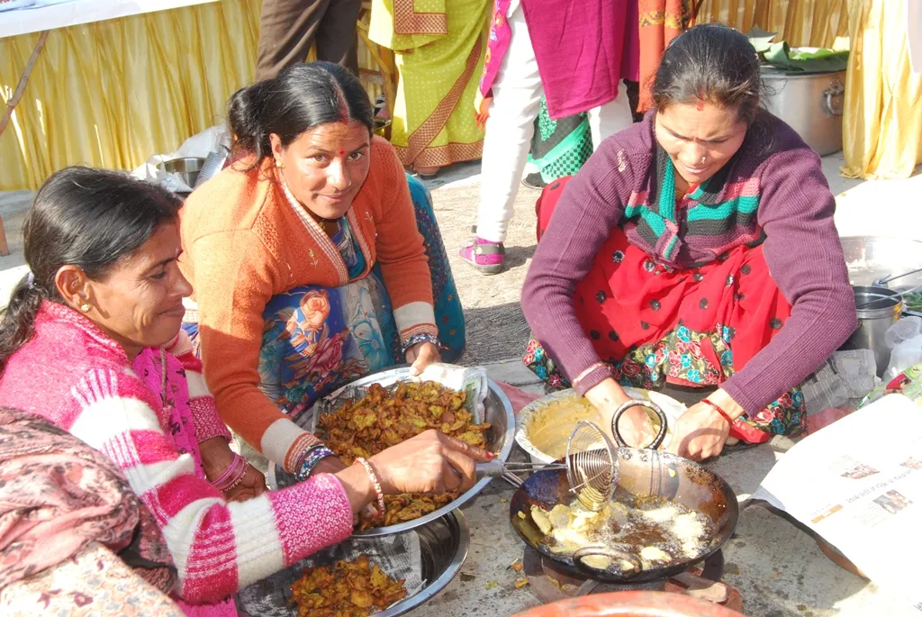 SHG women cooking food