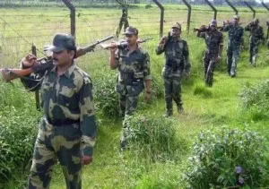 (FILES) In this picture taken on August 19, 2005, Indian Border Security Force (BSF) personnel take part in a patrol along the border with Bangladesh, in the Fulbari district in the north-eastern state of West Bengal.  Indian security forces shot dead two Bangladeshi border guards while they were patrolling along the country's northwestern frontier, an official said July 18, 2008. Bangladesh Rifles chief Major General Shakil Ahmed told AFP the two guards suddenly came under attack by the Indian Border Security Forces (BSF) at midnight.   AFP PHOTO/STR/FILES (Photo credit should read STR/AFP/Getty Images)