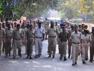 Police stage flag march in Rental Colony 
