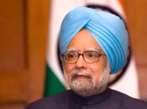 India's Prime Minister Manmohan Singh speaks during a news conference in Washington November November 25, 2009. Singh said on Wednesday that he saw no major hurdles to quickly implementing a bilateral civil agreement with the United States that would open up India's potential $150 billion market in power plants.    REUTERS/Molly Riley  (UNITED STATES POLITICS BUSINESS)