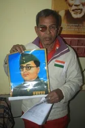 Accused Upendra Mohanty with the picture of his hero 