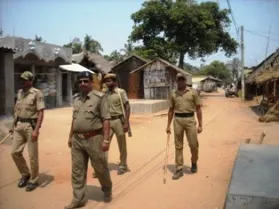 Police guard Natabarpur after the group clash