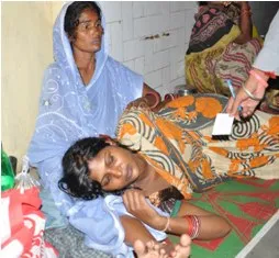 Anusmita lying on hospital verandah after the delivery (pIc-Biswaranjan)