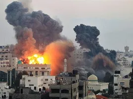 Gaza city hit by Israeli air strikes ( source-theguardian.com)
