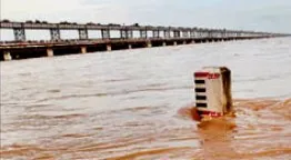 Swelling Mahanadi at Jobra Barrage