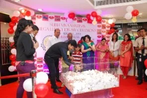 Cinestar & MP Sidhant Mohapatra taking out the winning coupon 