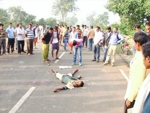 Bullet-ridden body of Bheema  lying on road