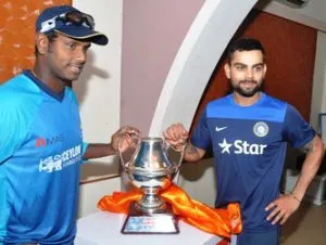 Rival Captains Virat Kohli and Angelo Mathews unveiling the trophy for the five-match India-Sri Lanka series ahead of the first match at Barabati on Sunday (Pic: Biswaranjan Mishra)