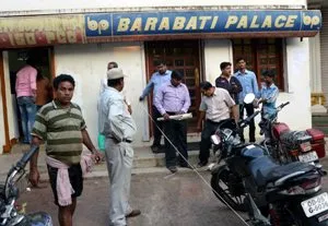 Revenue officials measuring the land on which Barabati Palace stands 