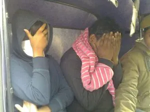 Biswajit and Nitsuhree being taken away by police after their arrest on charges of culpable homicide Pic; Biswaranjan Mishra