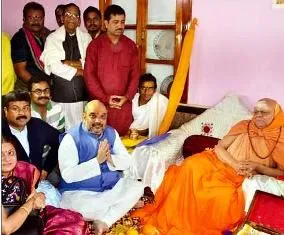 File Pic of BJP national president Amit Shah with the Shankaracharya in Puri
