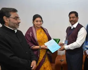 ET & T minister Sanjay Dasburma handing over a memorandum to Union HRD minister Smriti Irani in New Delhi