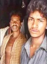 Kanhu (right) with his father Barun Behera