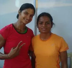 Srabani Nanda (left) and Dutee Chand (right) exult after winning the gold and silver medal respectively at the Federation Cup senior athletics meet at Managalore today