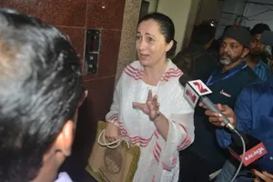 Romanian woman Moren Elena being accosted by the Zee Kalinga camera crew at the State Commission for Women where she had gone to lodge a complaint against the news head of the channel Satya Prakash Nayak on Tuesday (OST Photo) 