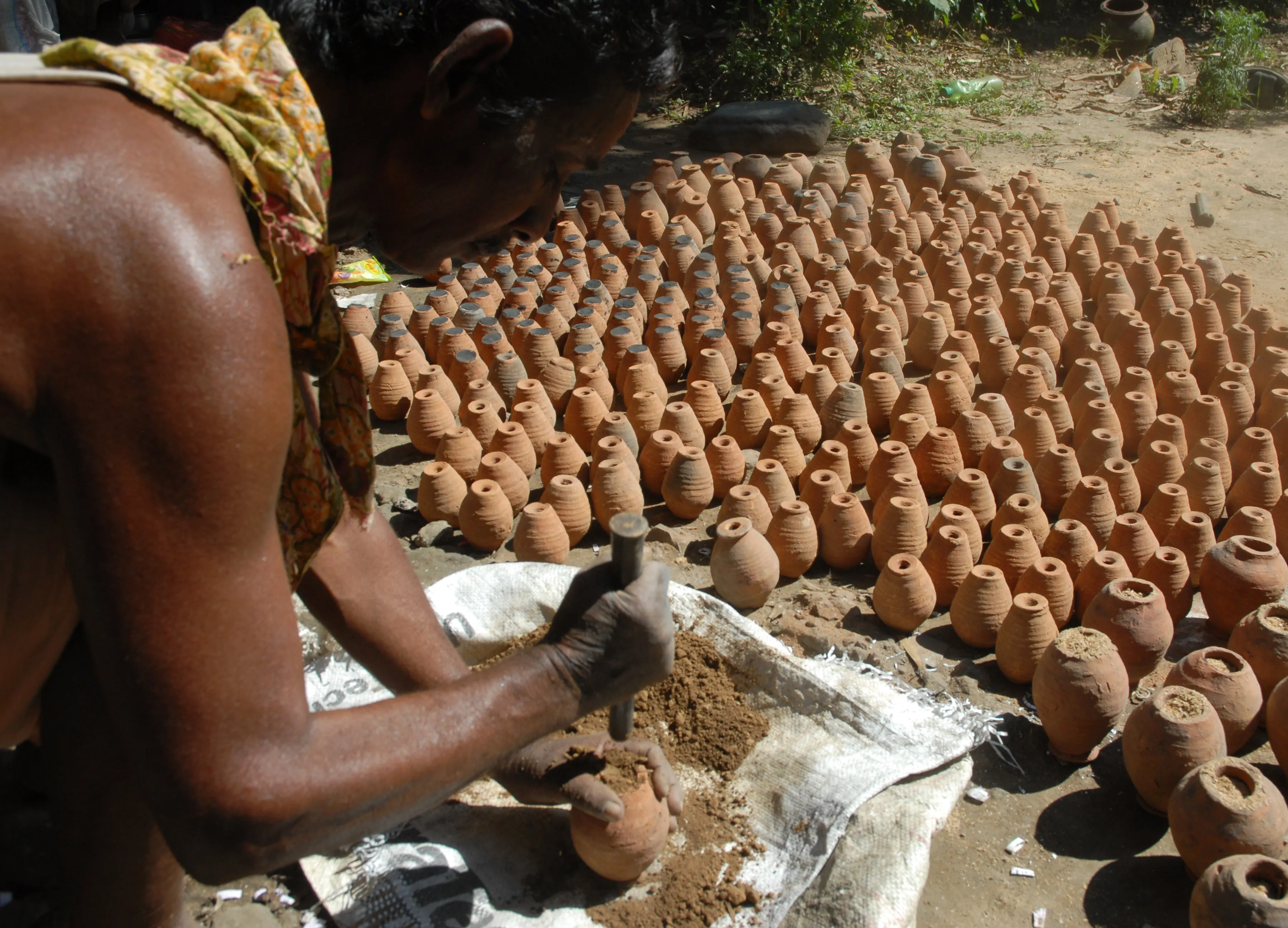 A man making 'Ghadi'