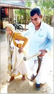 woman chained by son