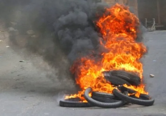 tyre burning bandh Congress