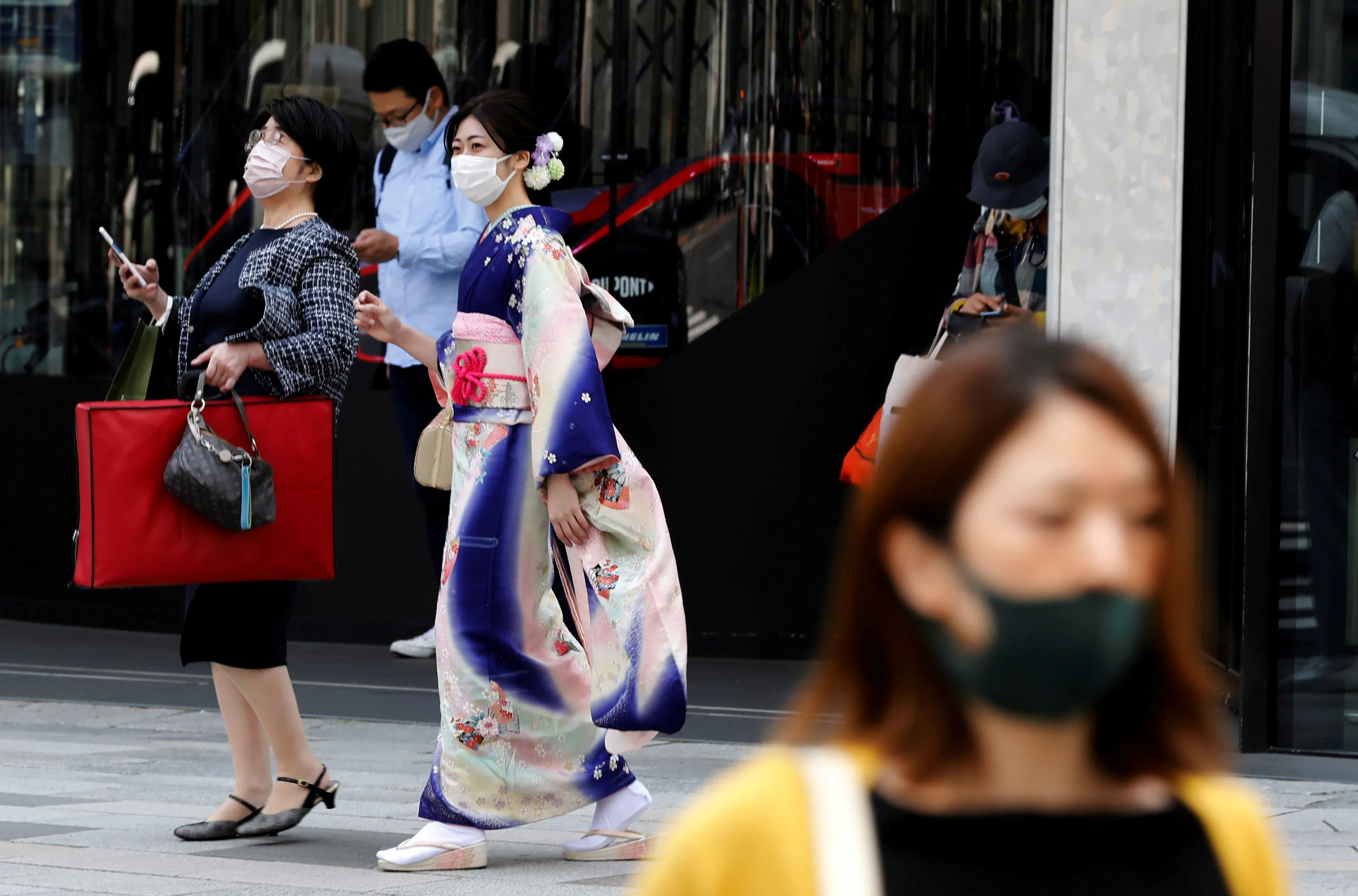 Japan extends COVID emergency in Tokyo, PM Suga says Olympics still going  ahead | Reuters