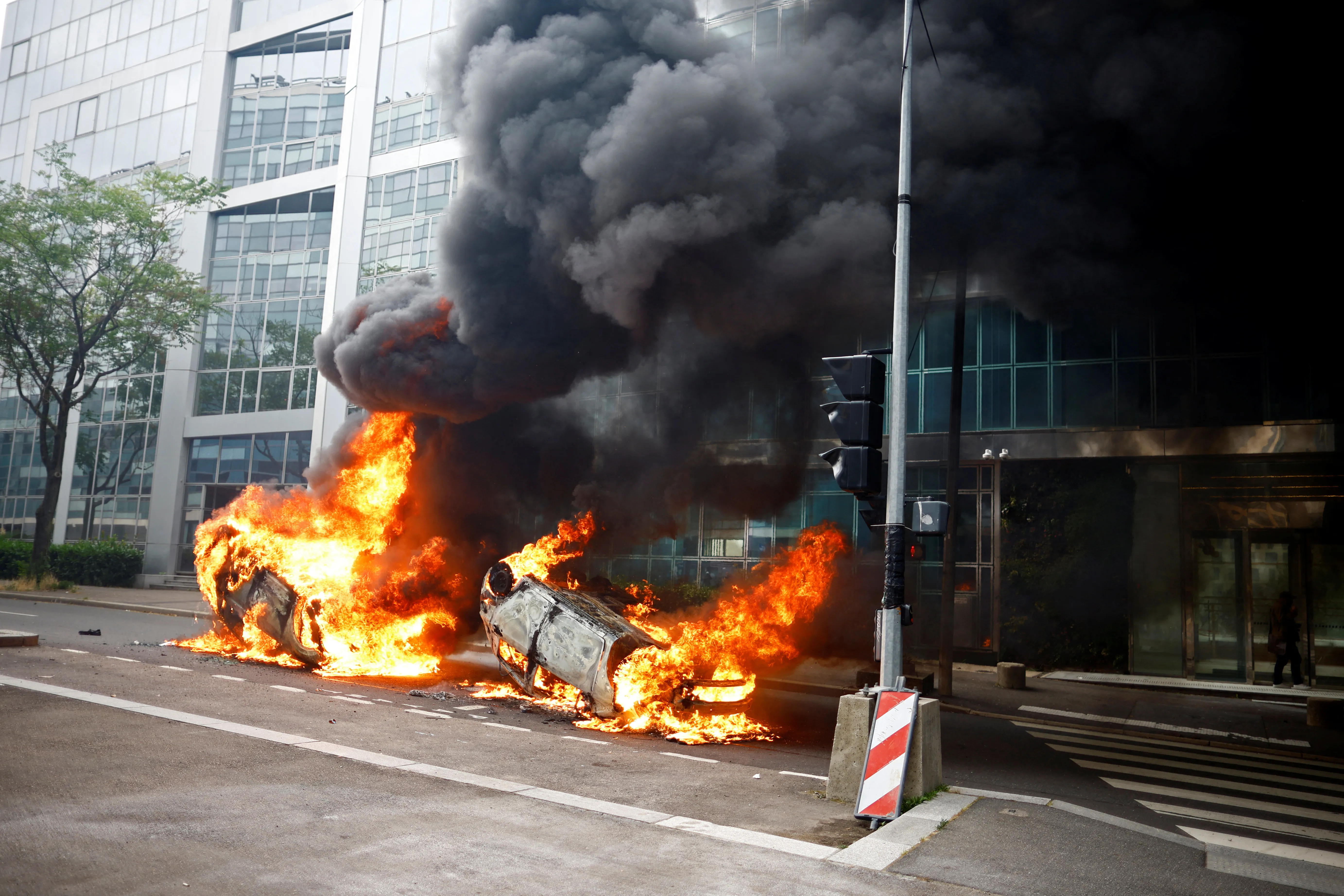 France unrest: Third night of riots after police shoot teen, officer charged | Reuters