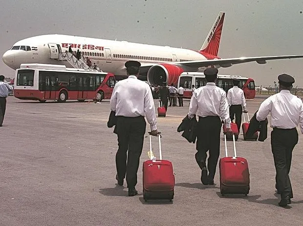 Pilots, cabin crew won't fly for 48 hours after getting Covid vaccine: DGCA  | Business Standard News