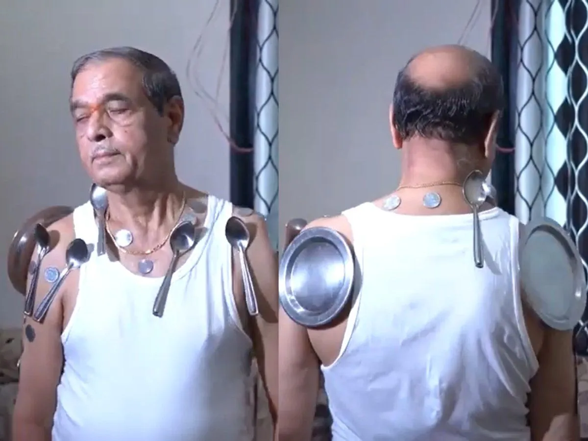 Arvind Sonar| Nashik man claims he got magnetic powers after taking second dose of COVID-19 vaccine - Watch Viral Video | Trending & Viral News