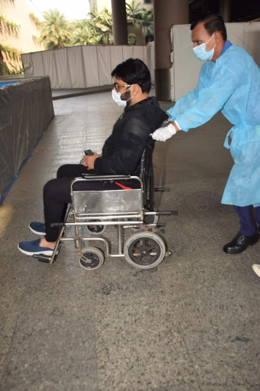 Image result for kapil-sharma-on-wheelchair-spotted-at-airport-angry-on-photographers