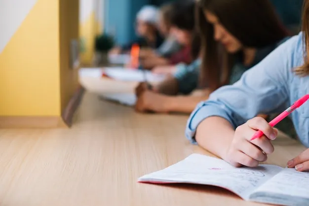 Premium Photo | Unrecognizable schoolgirl writing in notepad