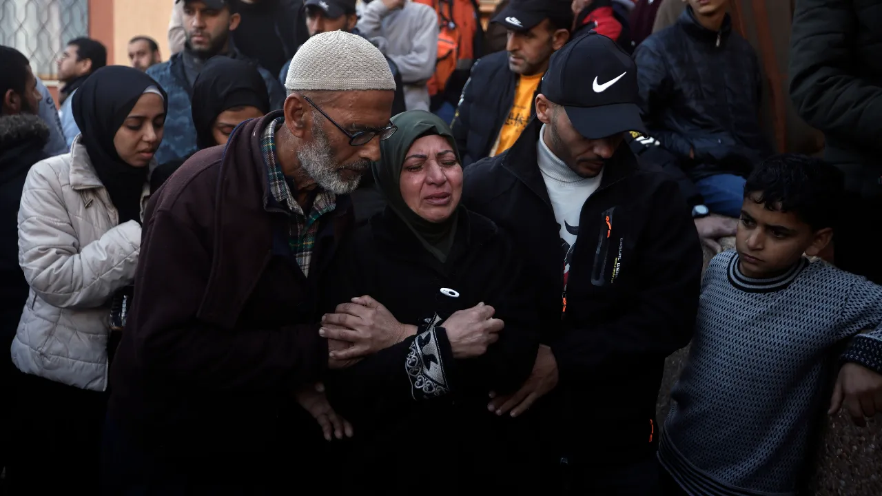 Palestinians mourn relatives killed