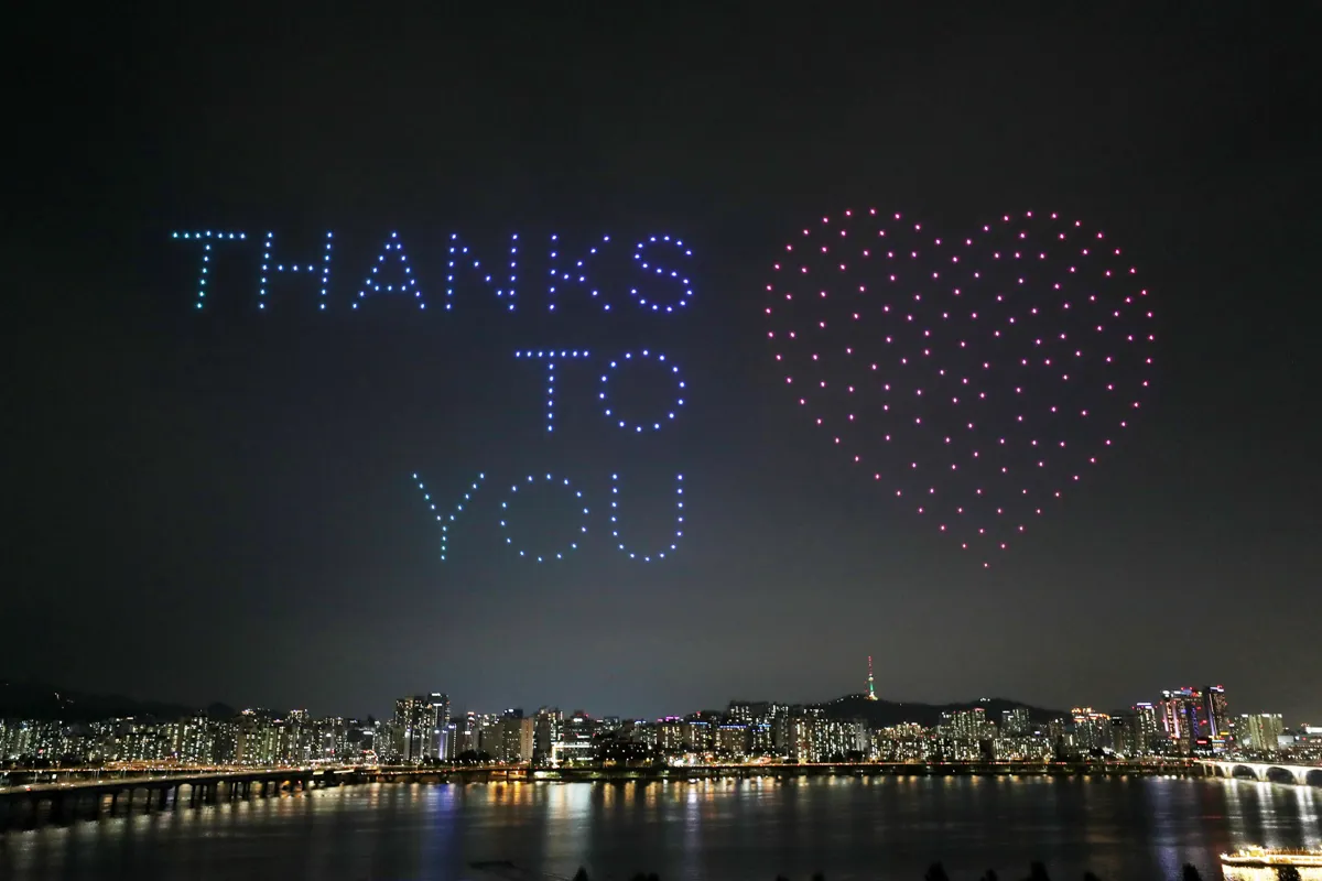 'Thanks to you,' the drones wrote in the sky next to a heart shape, before forming a silhouette of the Korean Peninsula with the message: 'Cheer up, Republic of Korea.'<South Korea's Ministry of Land, Infrastructure and Transport/Handout via Reuters>