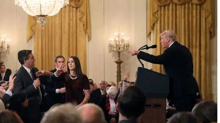 trump says reporter will be thrown out if he misbehaves again