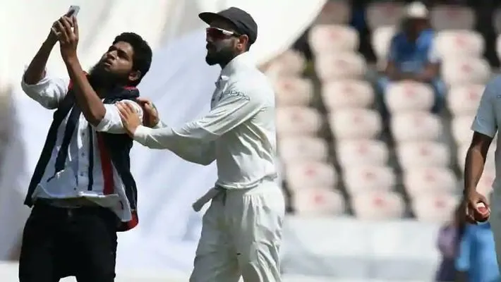 ind vs windies 2nd test Case filed against fan who tried to take selfie with Kohli