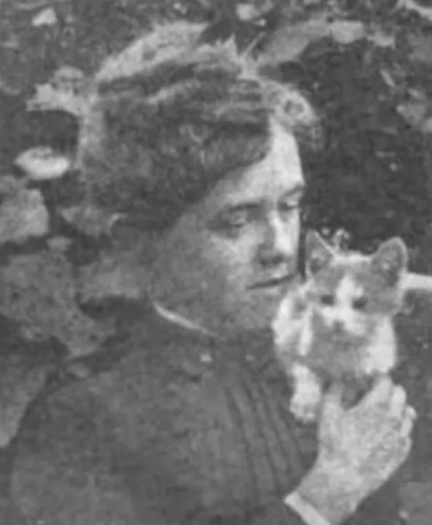 Davis cuddles a kitten in a photograph taken while she was a college student. Life and Labor, Volume 4