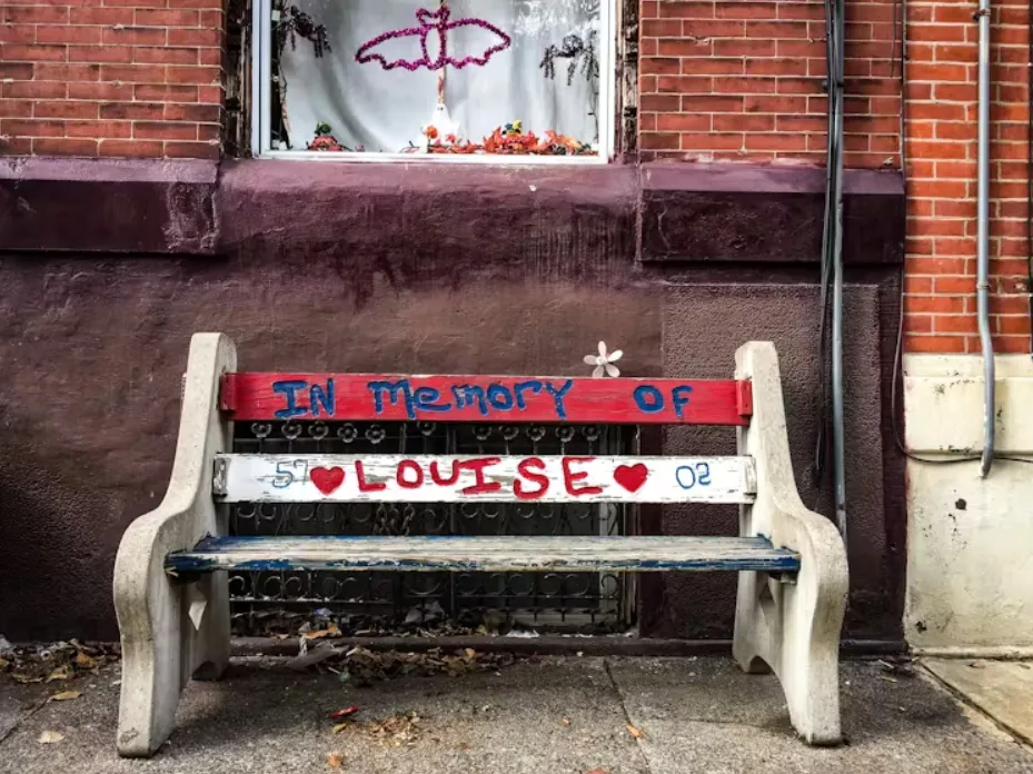 Neighborhood memorials like this park bench are a way for residents to publicly express their private grief. Gordon Coonfield/Kensington Remembers, CC BY-NC-ND