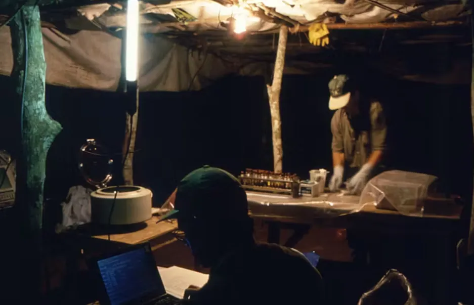 In the Democratic Republic of the Congo, researchers work in an on-site field laboratory while tracking a mpox outbreak in 1997. Smith Collection/Getty Images)