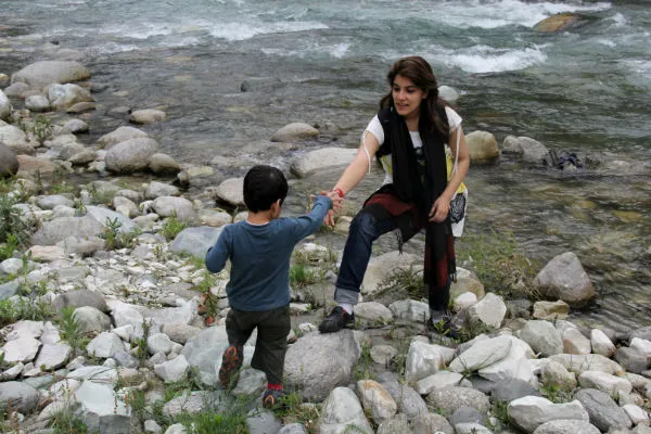 With her son Kazuo Imad, who is mostly with her in her art studio and her client meetings