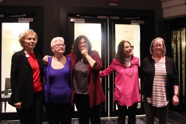 Marlene Sanders, Mary-Jean Collins, Mary Dore, Alice WolfSon and Nancy Kennedy share some light moments