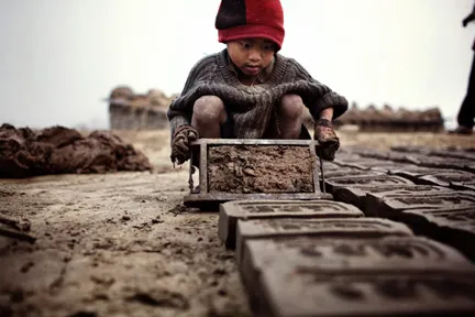 For year-old Yadhu making bricks with moulds. Picture By: RFI