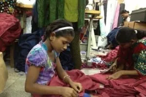 Young girls working for the garment industry