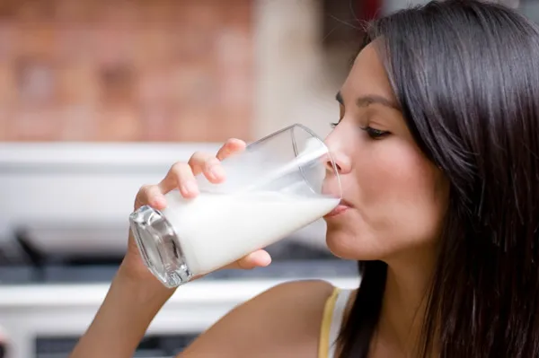 woman drinking milk