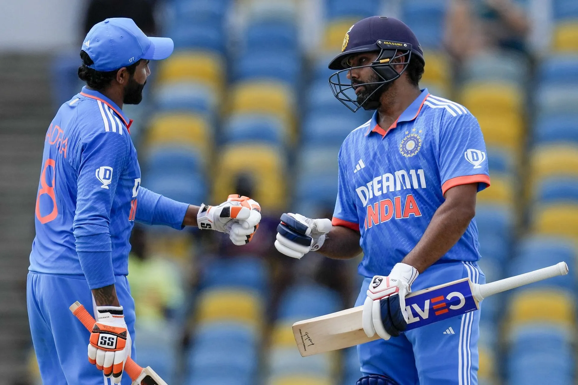 India's captain (right) with Ravindra Jadeja (Pic: AP Photo/Ricardo Mazalan)