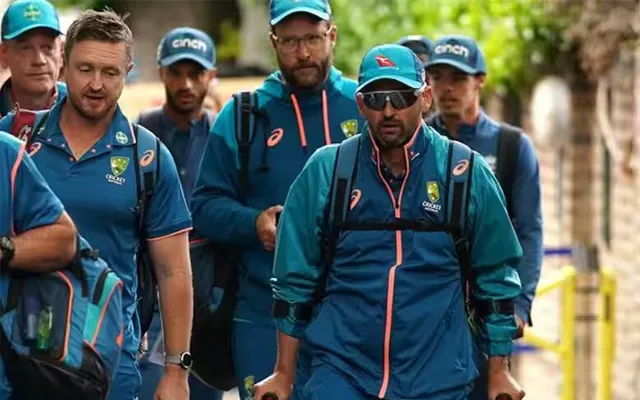 Nathan Lyon walking with crutches