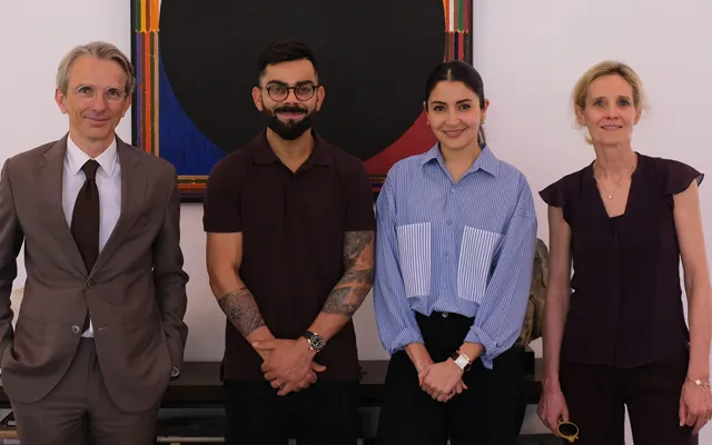 Virat Kohli and Anushka Sharma with France's ambassador to India.